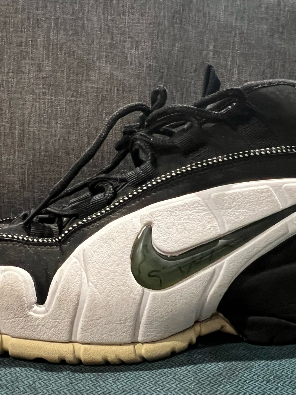 Nike Black and White Sneaker with Green Swoosh.